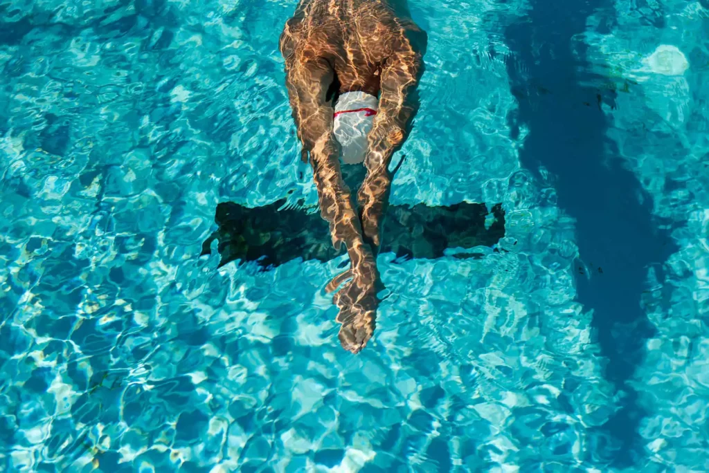 high-angle-male-swimmer-water-pool