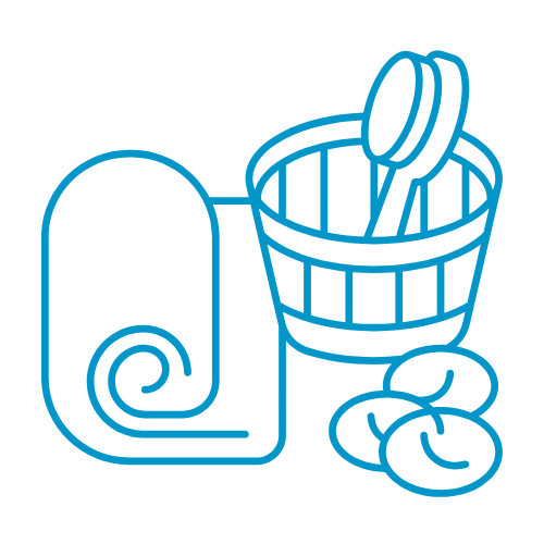 a bucket with a brush, hot stones and towel