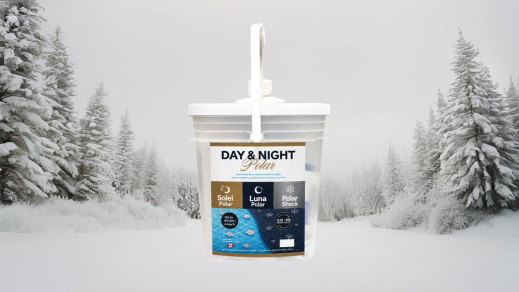 a photo of a clear, squared, plastic bucket with a white lid and handle. the label is white with black, blue, and gold accents, and reads "day & night polar". the kit features solei polar, luna polar, and polar shock. it is a pool closing chemicals kit. the background is snowy and snow covered fir trees line both the left and right sides of the image.